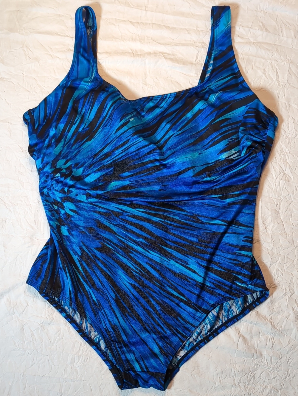 Sleek Blue Patterned One-Piece Swimsuit with Flattering Ruched Side
